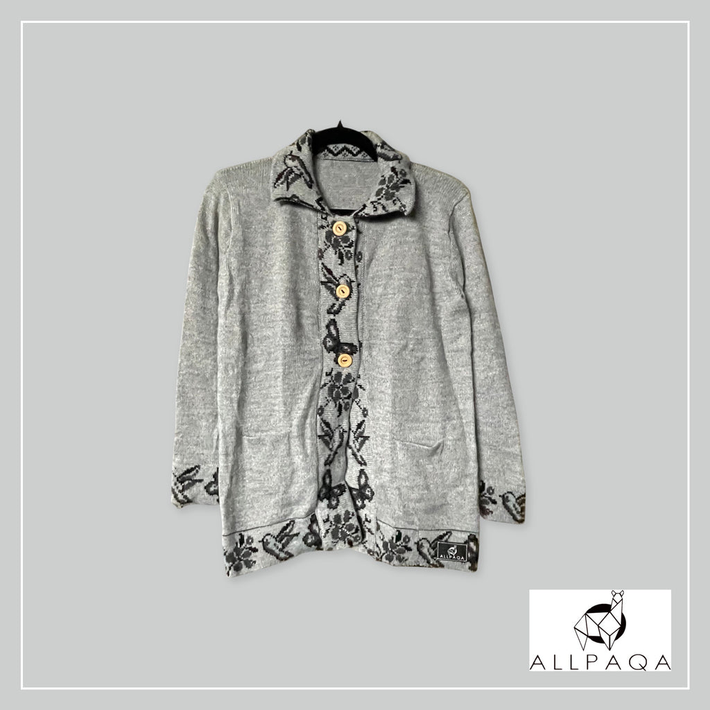 Handmade alpaca button-up cardigan in light grey with black nature details