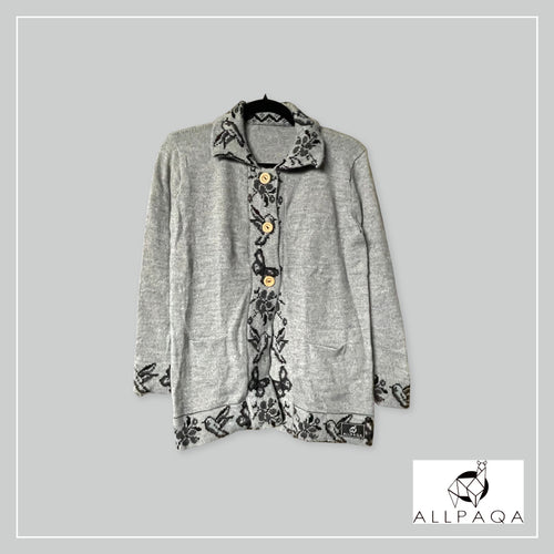 Handmade alpaca button-up cardigan in light grey with black nature details