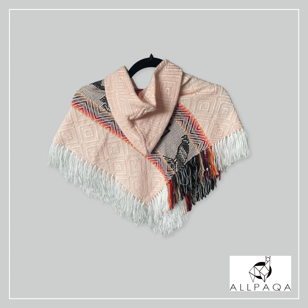 Handmade kids alpaca poncho in peach with alpaca pattern