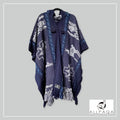 Handmade alpaca poncho in blue with alpaca pattern