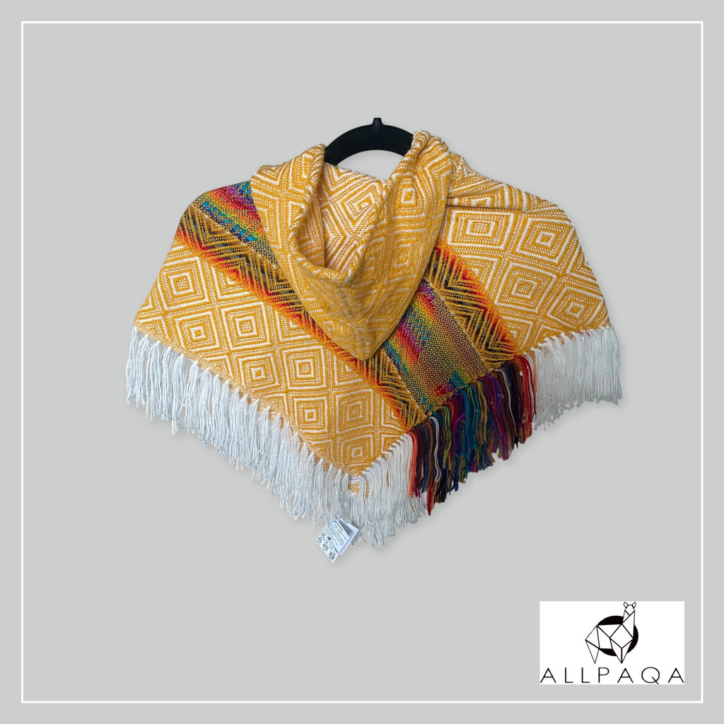 Handmade kids alpaca poncho in orange with multicolour alpaca pattern