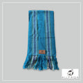 Handmade alpaca scarf in light blue with other shades of blue