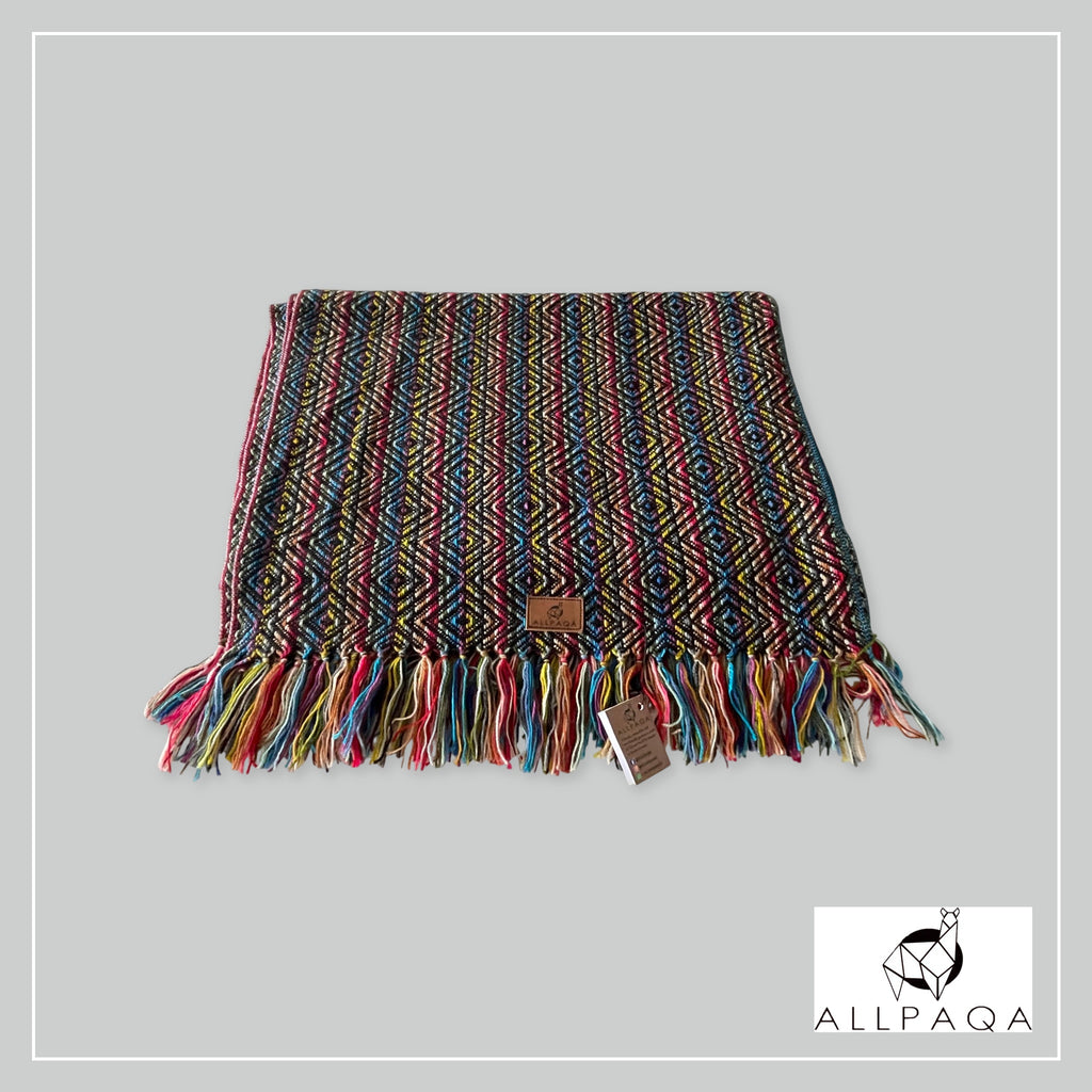 Handmade alpaca shawl in black with multicoloured strips