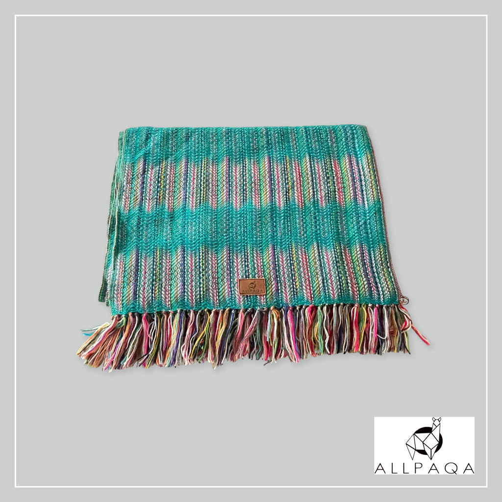 Handmade alpaca shawl in turquoise green with multicoloured strips