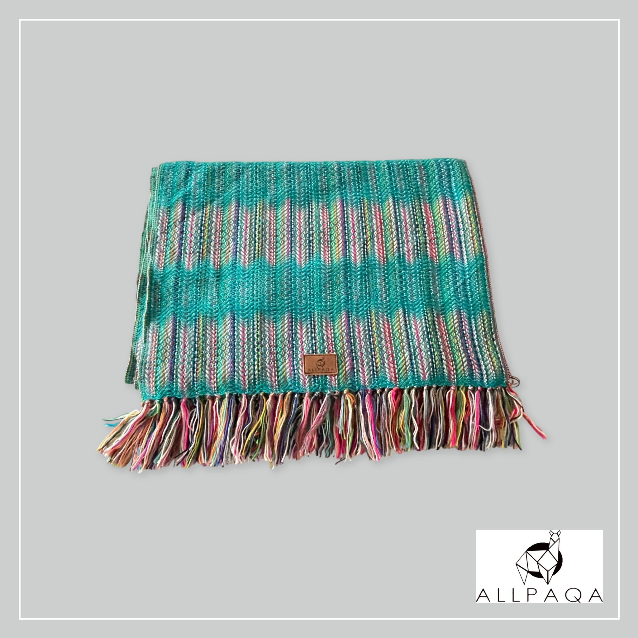 Handmade alpaca shawl in turquoise green with multicoloured strips