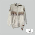 Handmade alpaca zip-up cardigan in cream with brown alpaca pattern