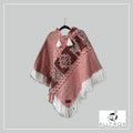 Handmade alpaca poncho in Red tones with Andean pattern in white