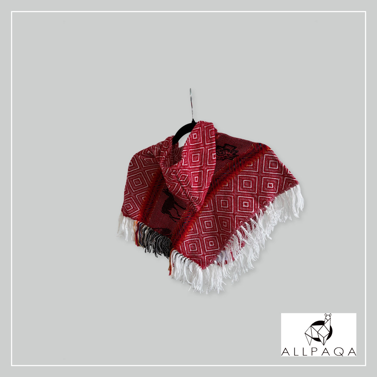 Handmade alpaca poncho in Red tones with Andean pattern in black - additional image