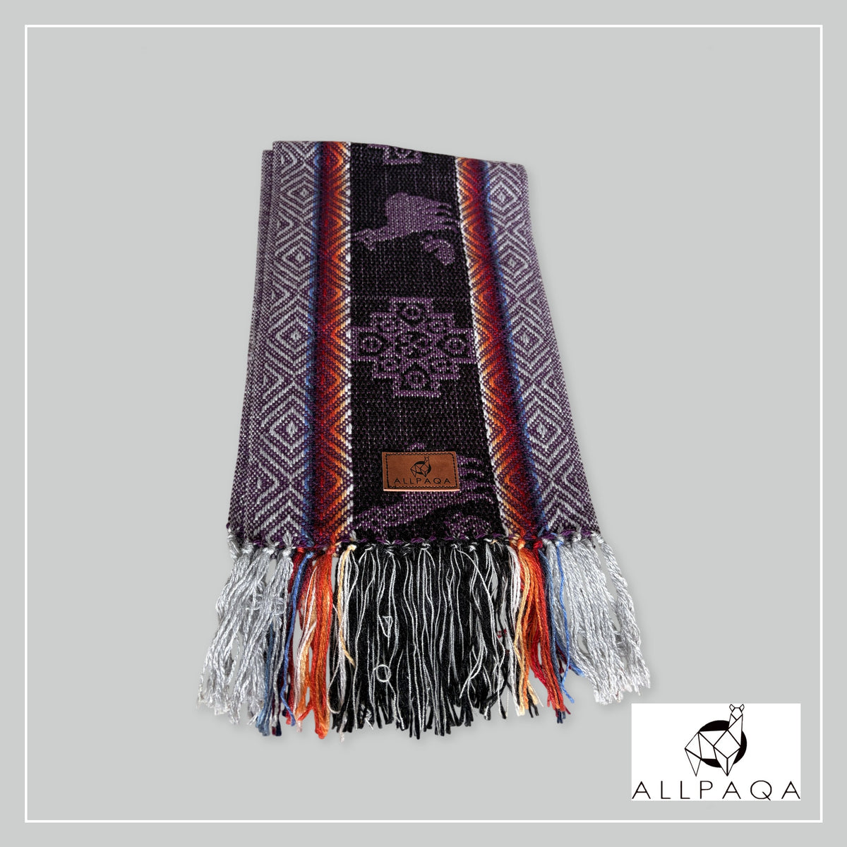 Handmade alpaca scarf in Tones of purple and red with andean patterns in purple