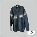 Handmade alpaca cardigan in Dark teal with white alpaca pattern