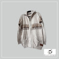 Handmade alpaca cardigan in Cream with alpaca pattern in brown tones