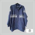 Handmade alpaca cardigan in Blue with alpaca pattern in white