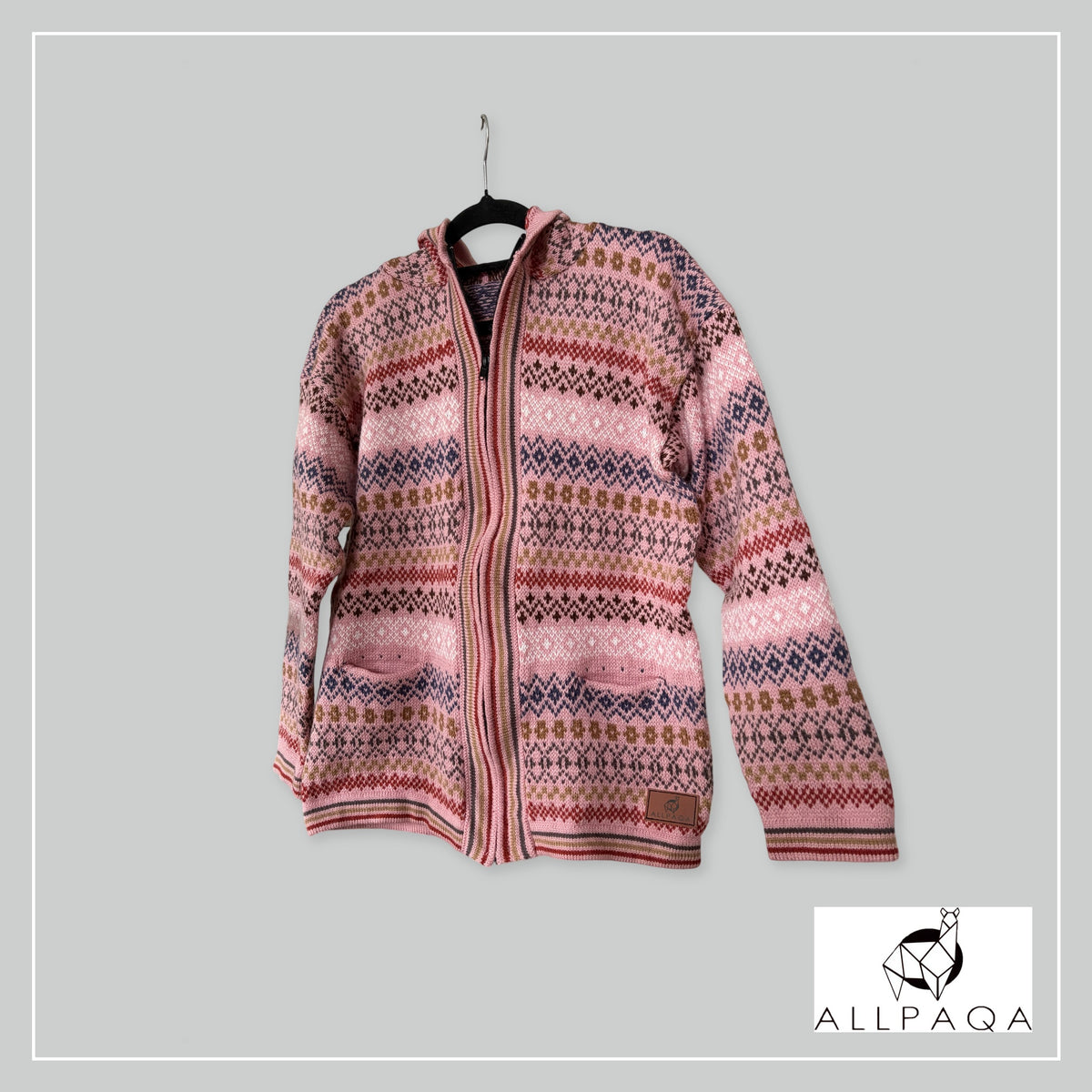 Handmade alpaca hoodie in Tones of pink with blue/brown stripes and patterns